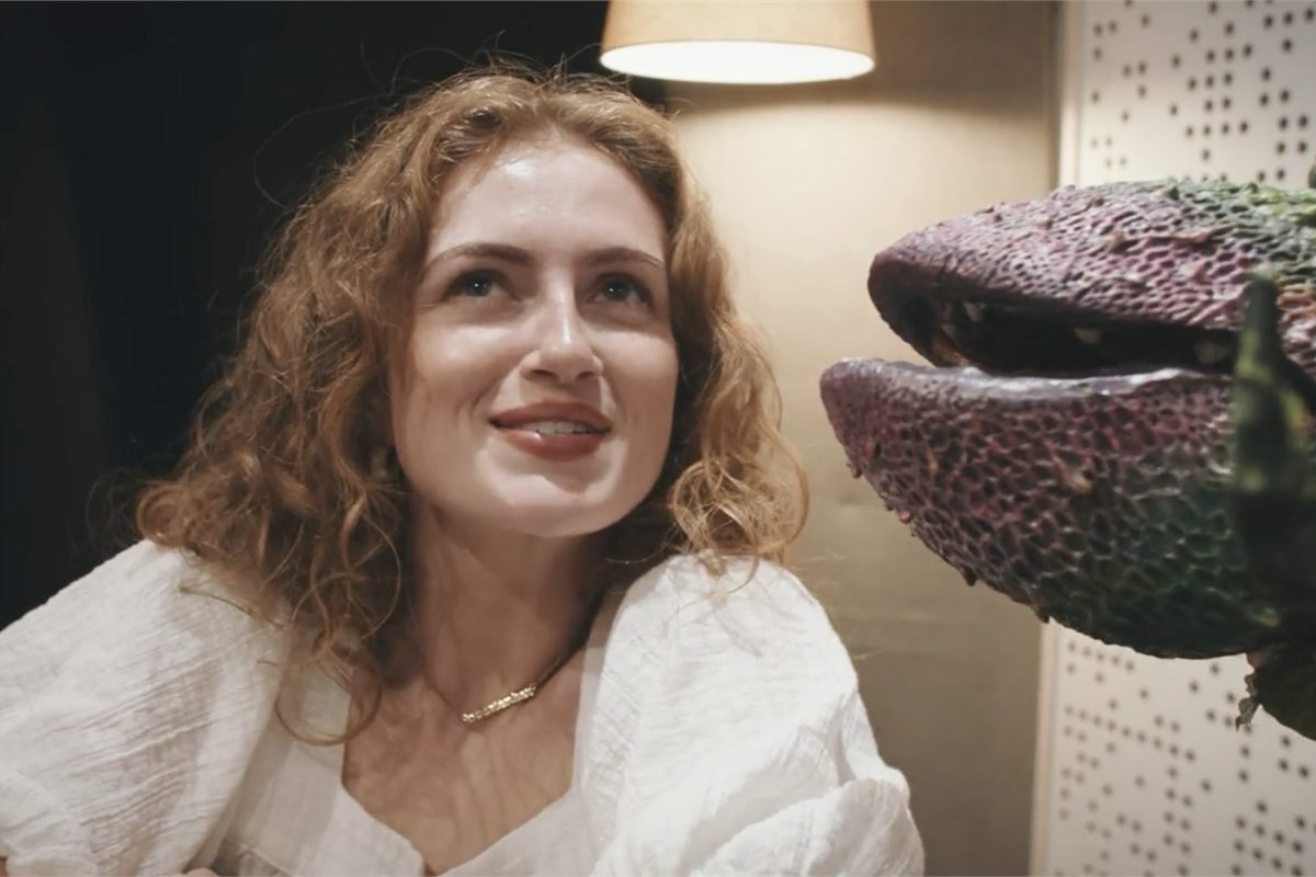 Maisie Smith as Audrey beside Audrey II in the new video from Little Shop of Horrors. Video by Adam Nightingale