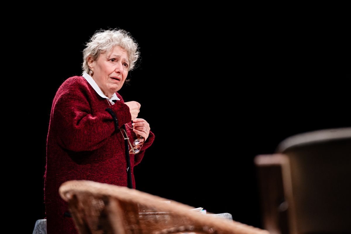 Beverley Klein as Rivka in a red cardigan in Memoriam at Southwark Playhouse Borough Beverley Klein as Rivka in a red cardigan in Memoriam at Southwark Playhouse Borough