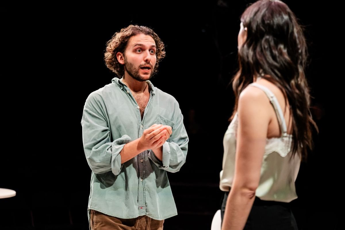 Two members of the cast face each other mid-argument in Memoriam Two members of the cast face each other mid-argument in Memoriam