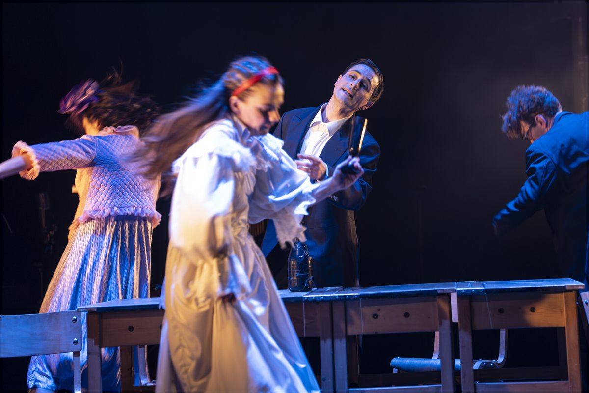 A celebration scene in The Nature of Forgetting by Theatre Re. Photo by Ellie Kurttz