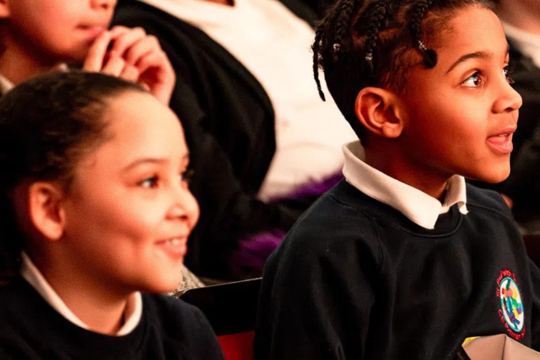 Schoolchildren watching a performance at Polka Theatre