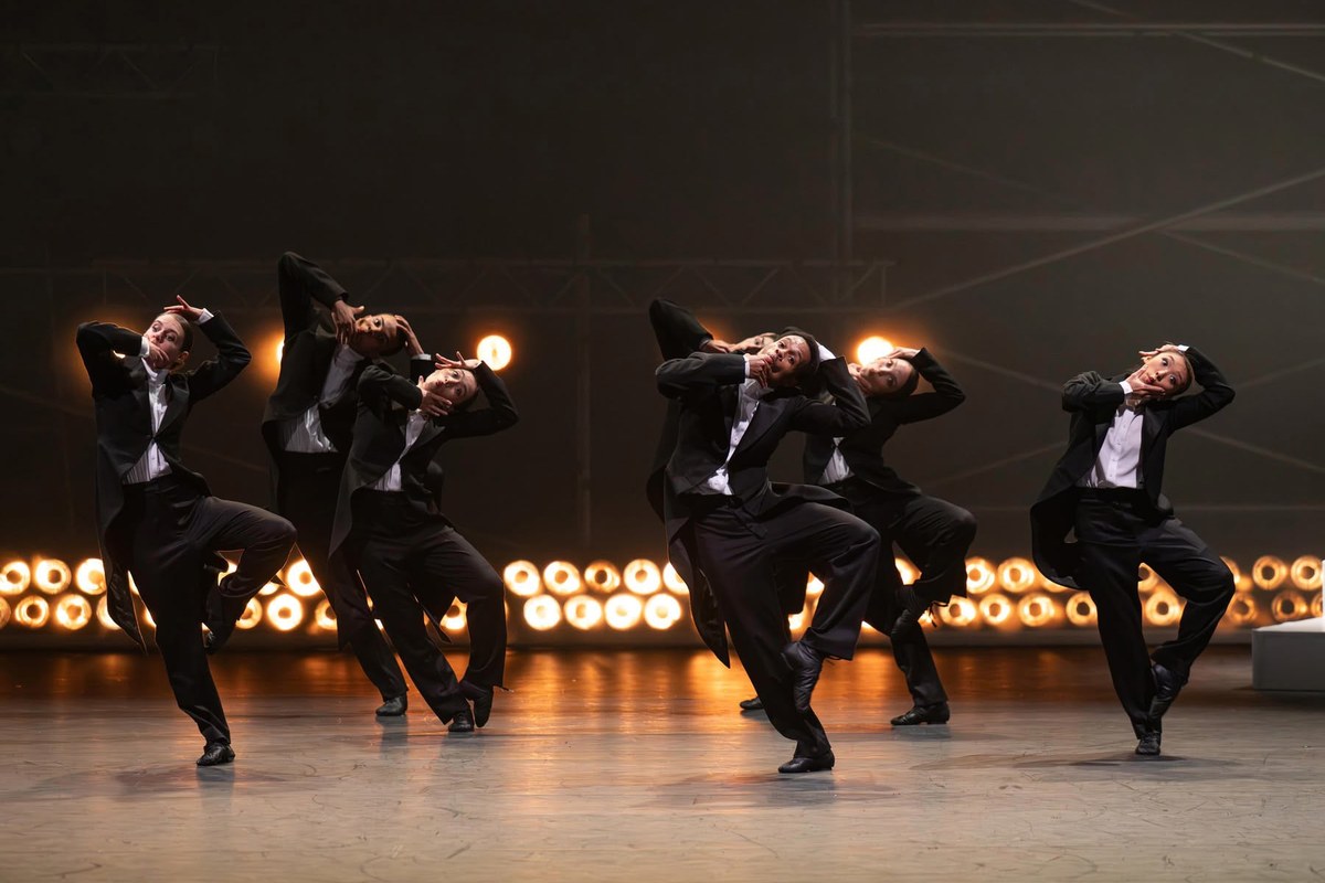 English National Ballet dancers in tailcoats in Micaela Taylor’s Bow Out. Photo by ASH