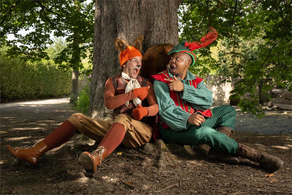 Lauren Chinery as Cyril the Squirrel and Folarin Akinmade as Robin Hood in Robin Hood at Queen’s Theatre Hornchurch. Photo by Mark Sepple