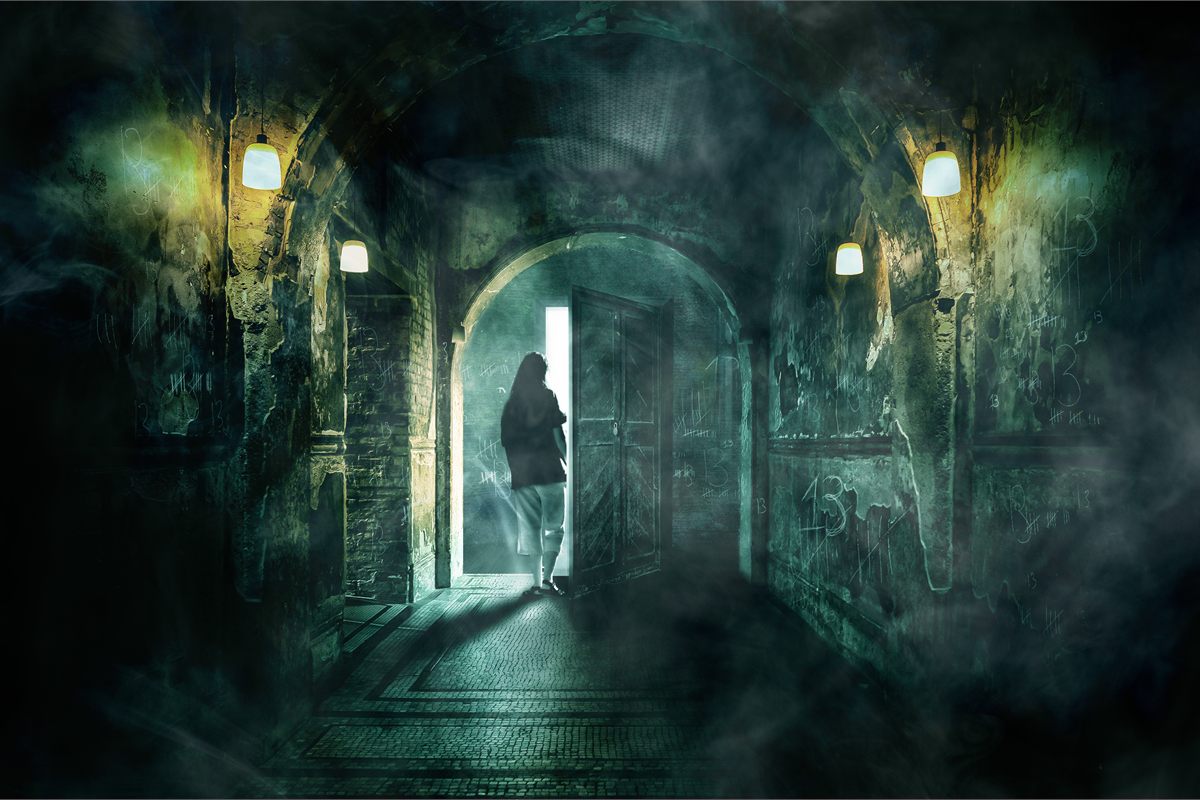 Key art for Room 13 at Battersea Arts Centre, showing a figure stepping through an open door into a smoke-filled corridor