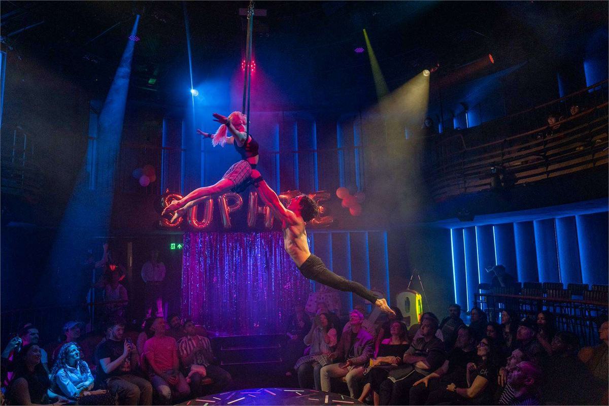 An aerialist performs above the audience in a Three Legged Race Productions Sophie show. Photo by Craig Sugden