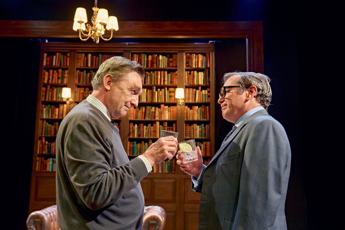 Two of the Gang of Three raising their glasses in a toast at Richmond Theatre