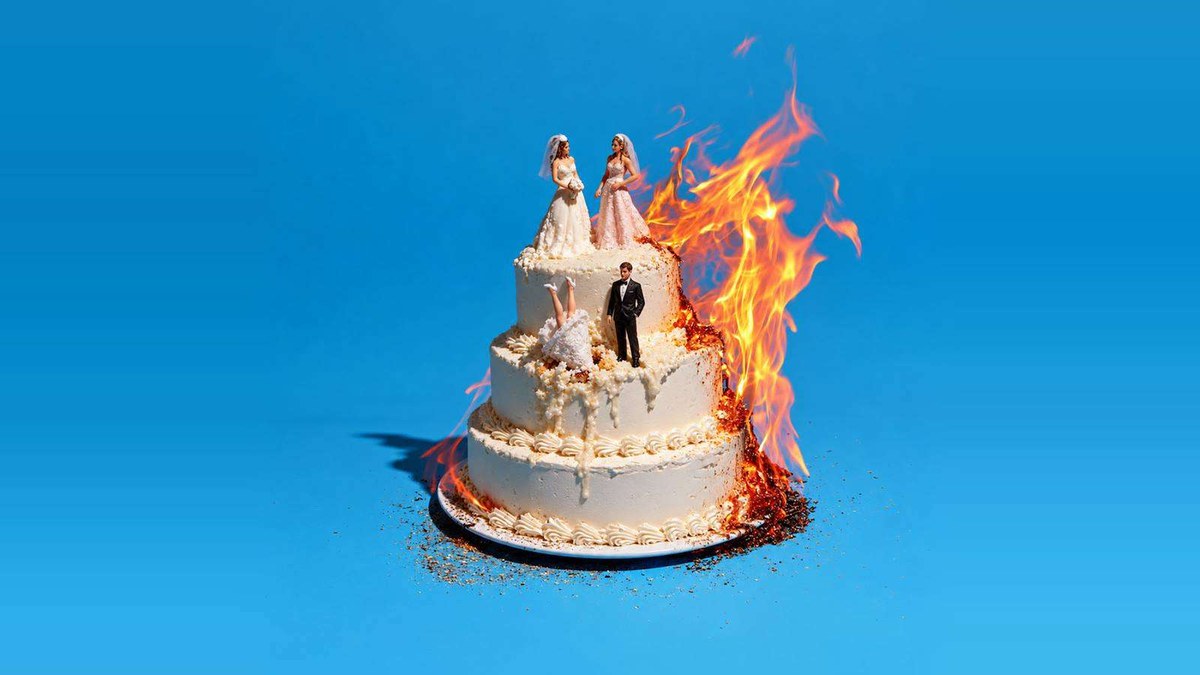 Artwork for The Wedding(s) by Max & Ivan at Park Theatre: a three-tier wedding cake on fire
