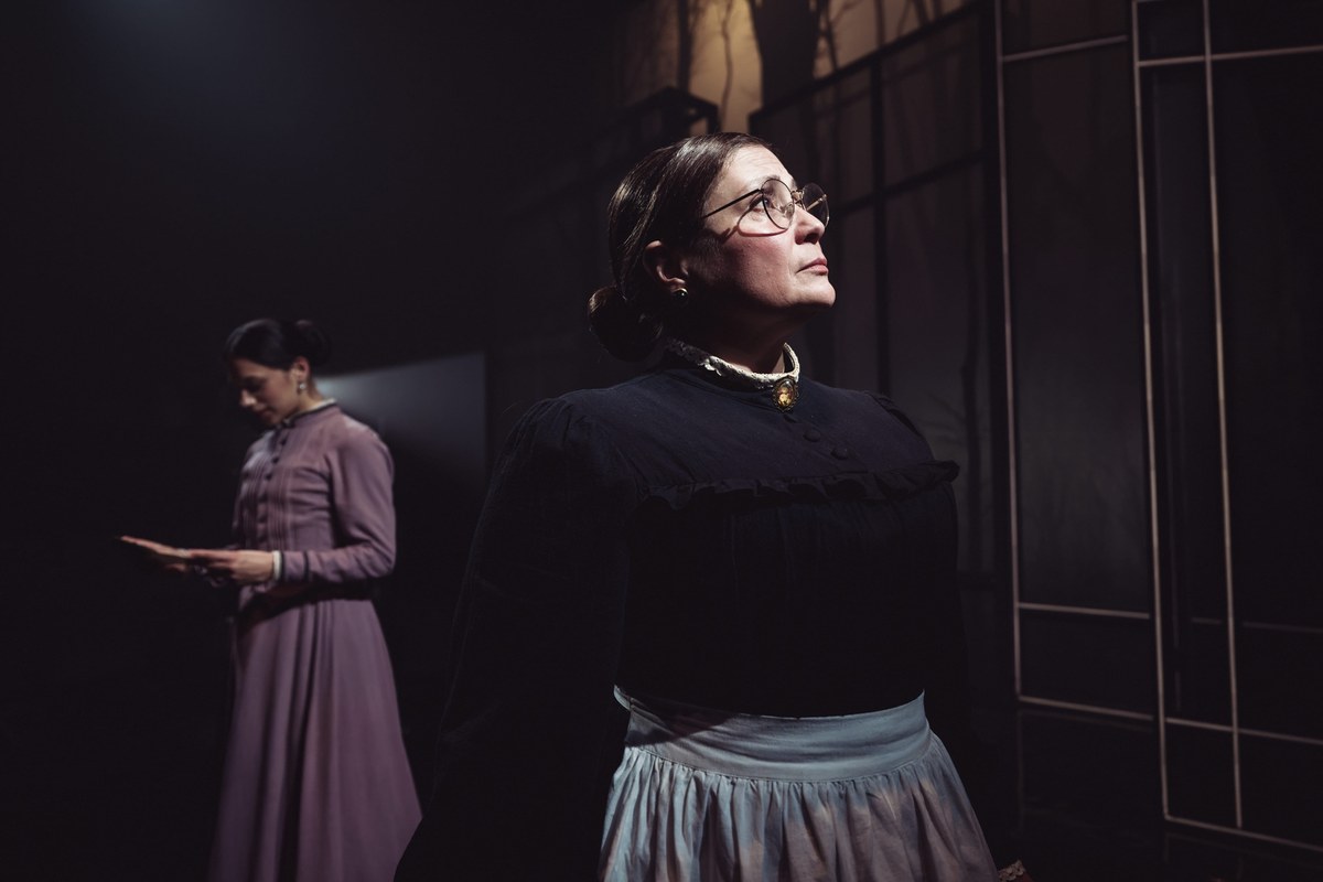 Amy Tara and Katy Slater as Mrs Grose in The Turn of the Screw at the Arcola Theatre